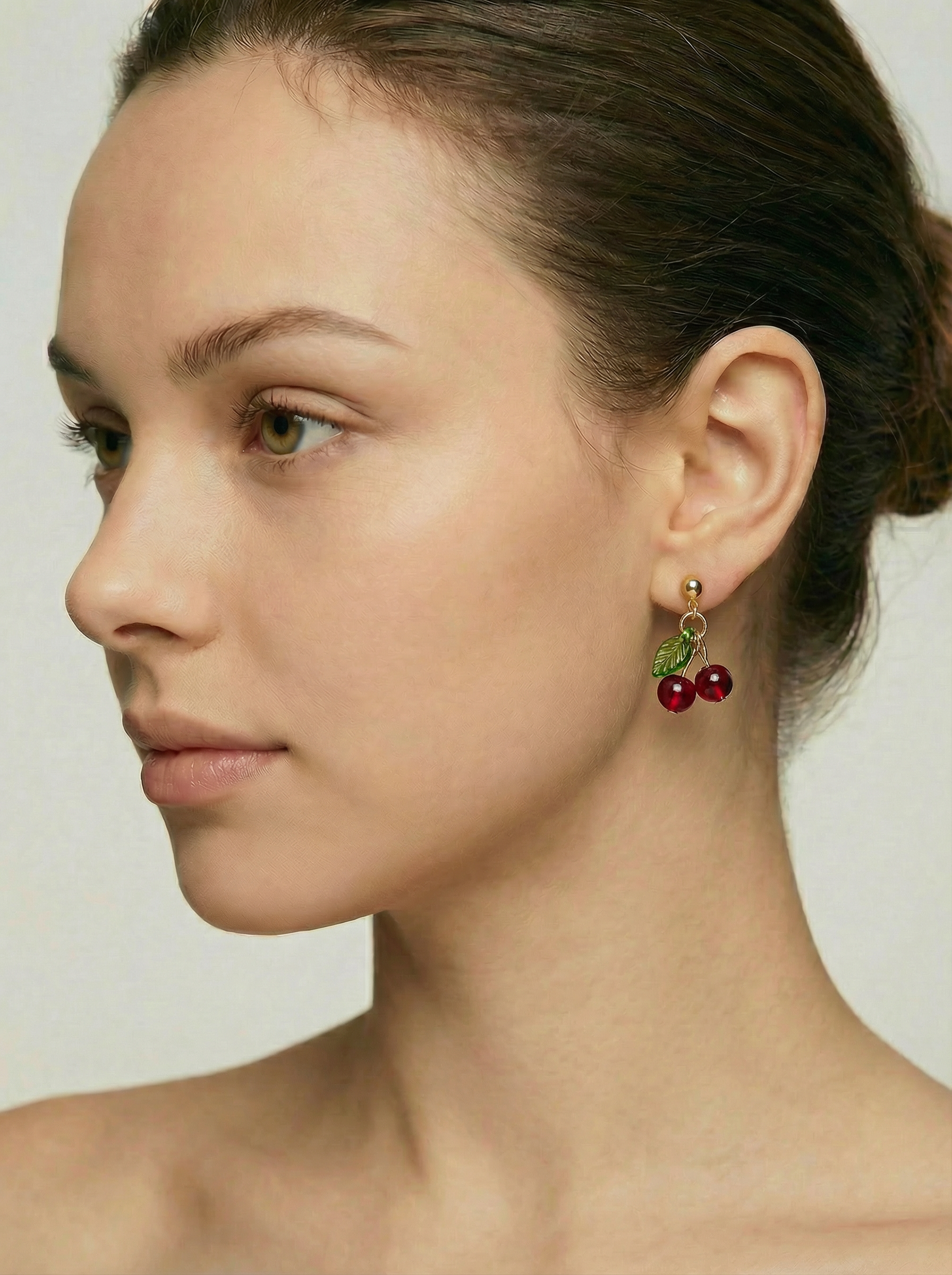 Gold-Tone Cherry Bead Dangle Stud Earrings - Model Side View