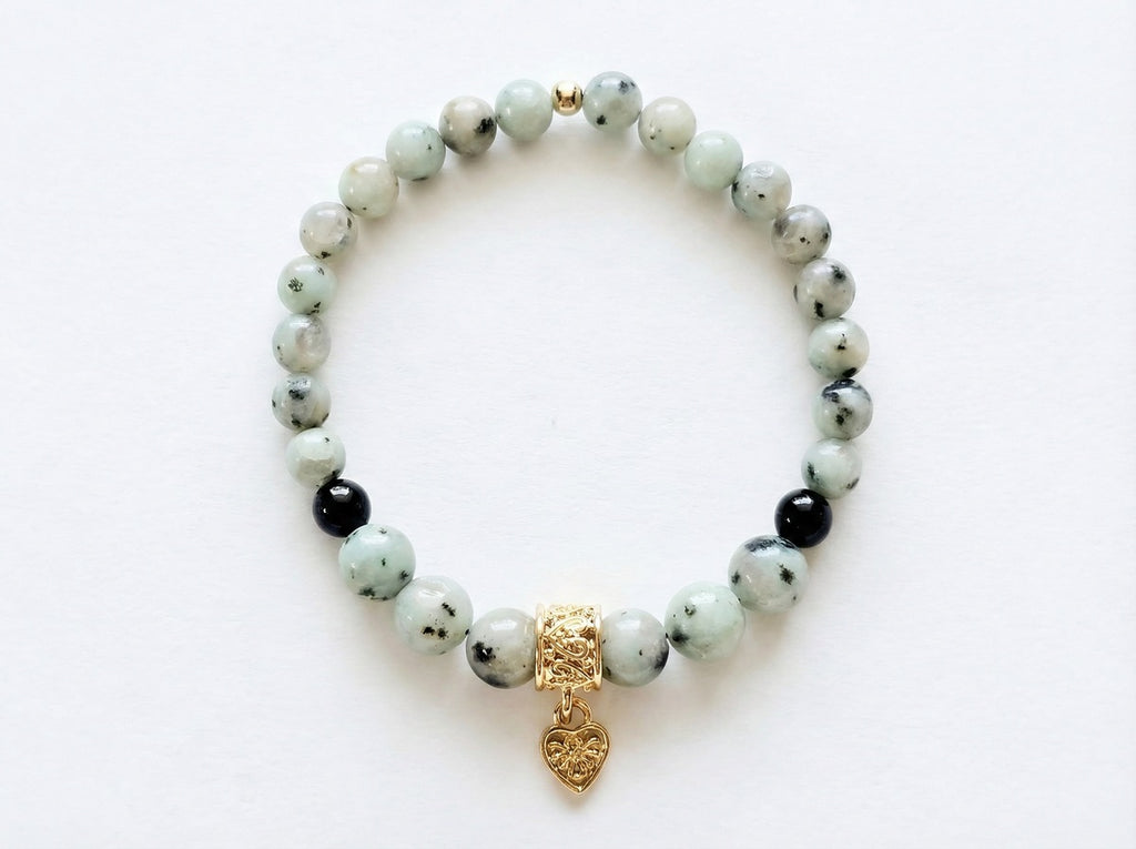 Sesame Jasper Heart Charm Bead Bracelet flat lay on white background