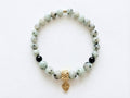 Sesame Jasper Heart Charm Bead Bracelet flat lay on white background