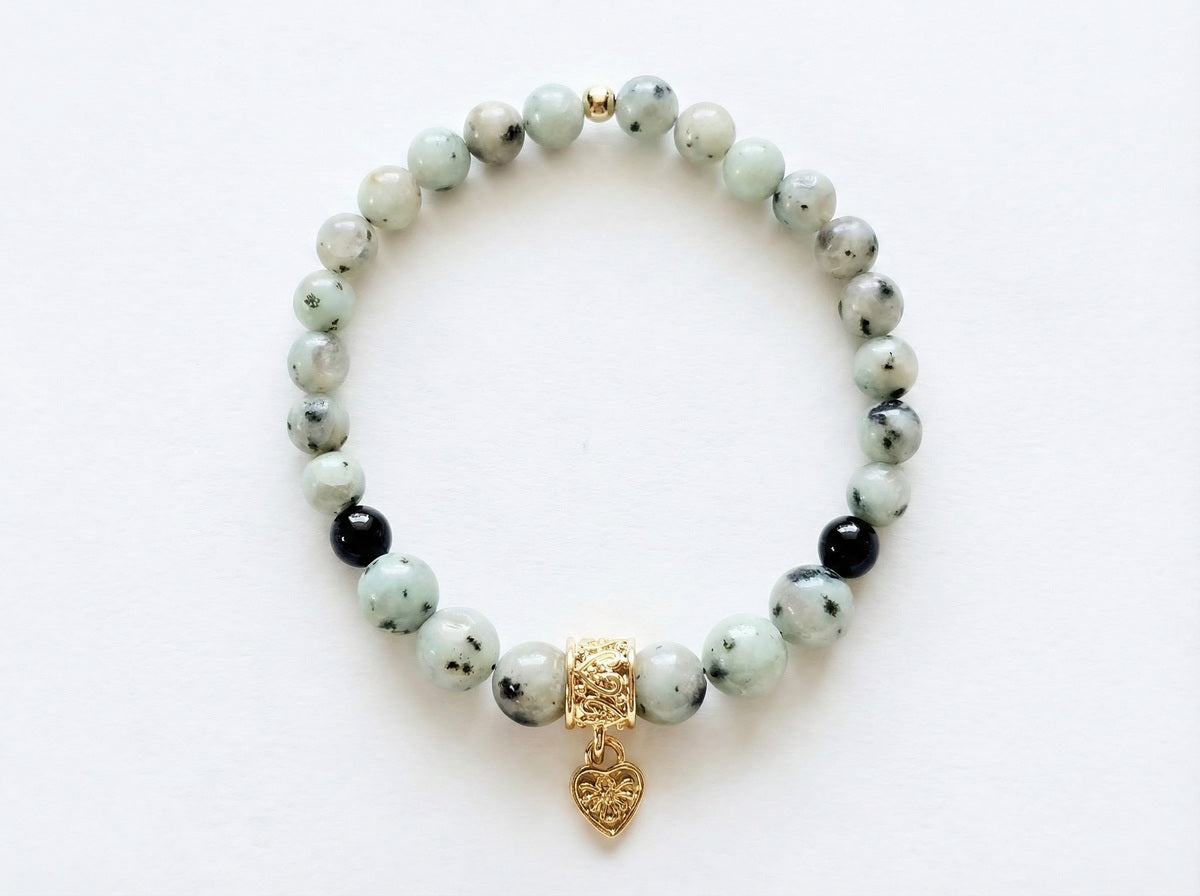 Sesame Jasper Heart Charm Bead Bracelet flat lay on white background