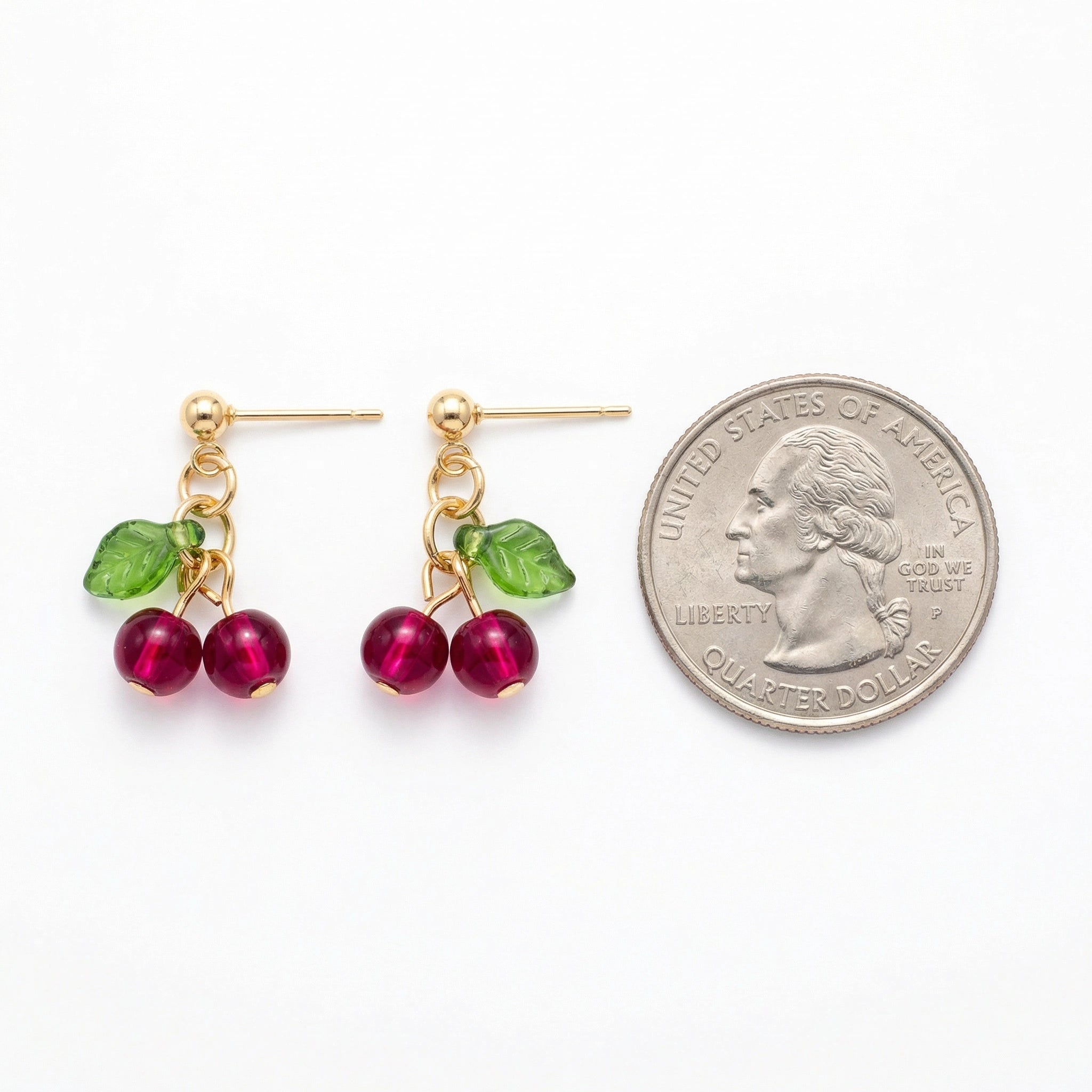 Gold-Tone Cherry Bead Dangle Stud Earrings - White Background with Quarter for Size Reference