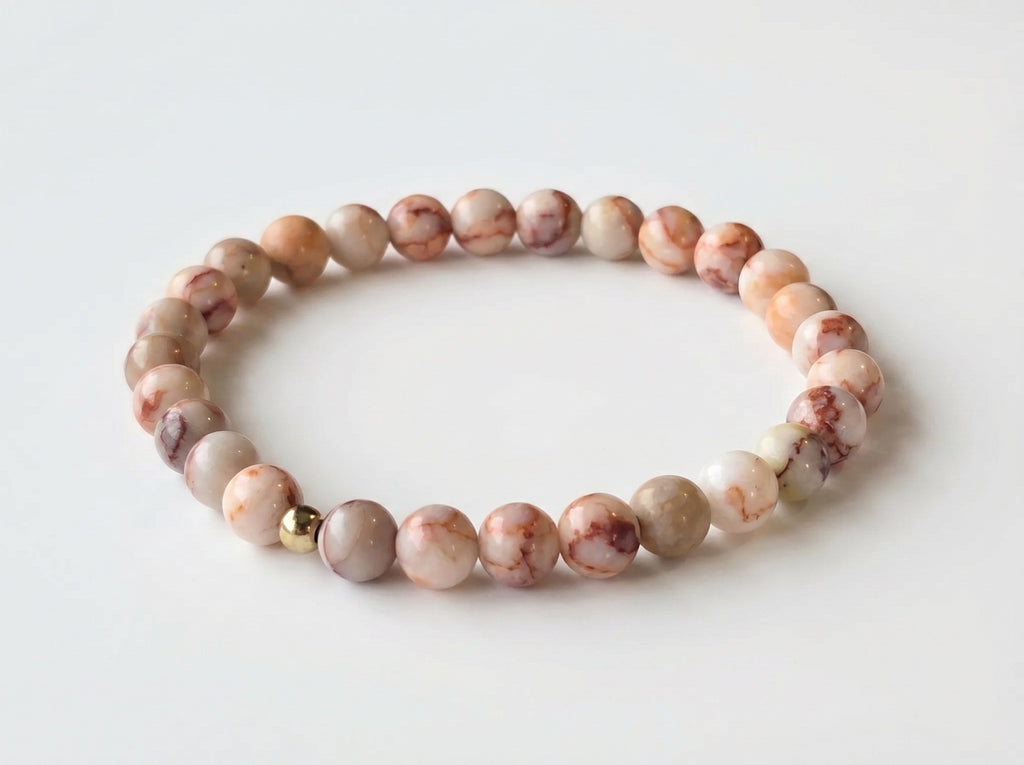 Red Network Jasper Bead Bracelet flat lay on white background