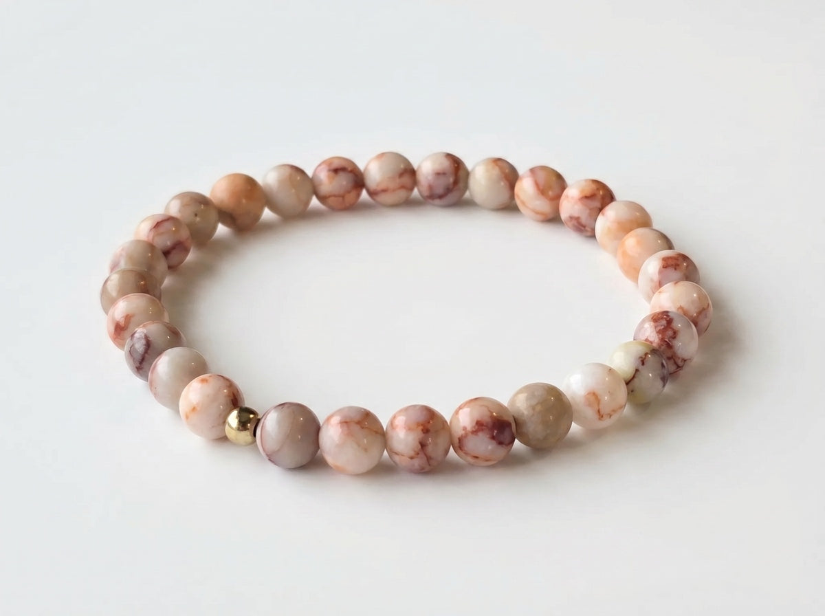 Red Network Jasper Bead Bracelet flat lay on white background